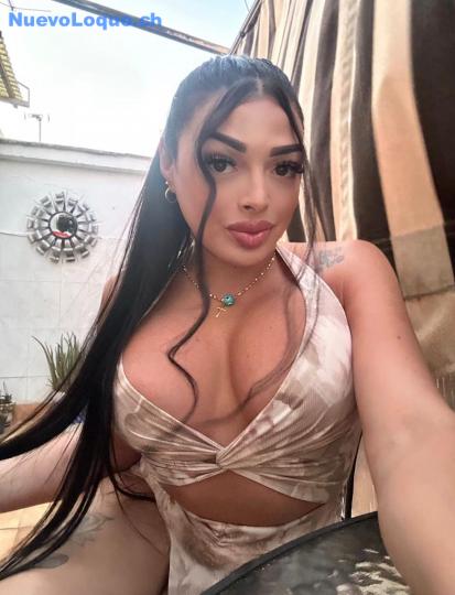 Trans Meliza alto standing profile photo